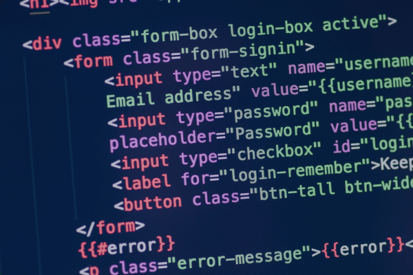Simple code displayed on a screen, representing early web development foundations.