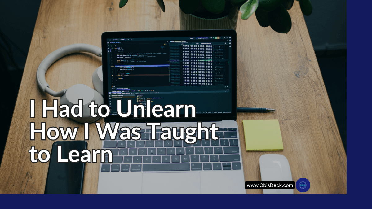 laptop displaying code on a desk with headphones representing a personal tech learning and unlearning process