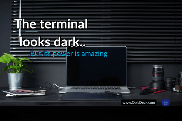 An image of a workspace showing a dark screened monitor depicting the visual appearance of a computer Terminal